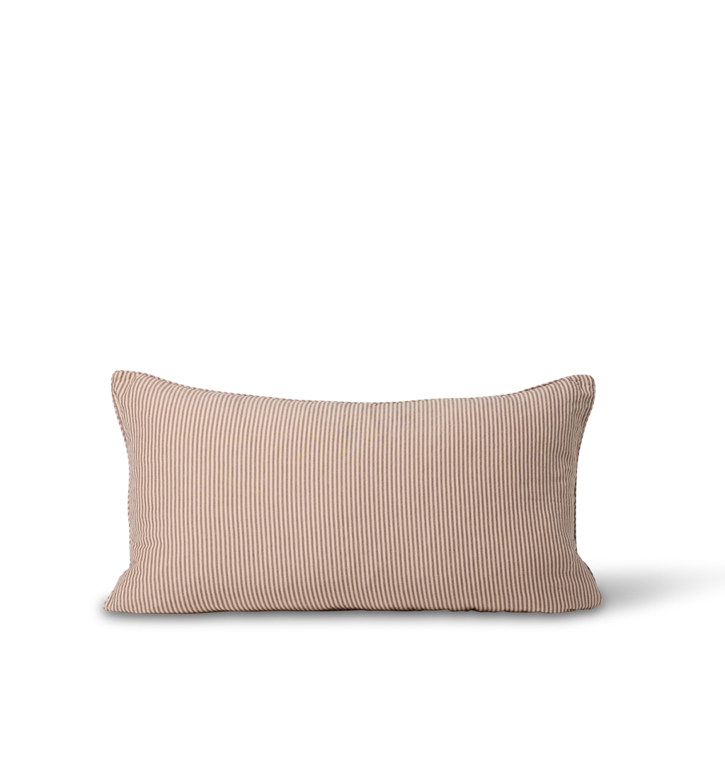 A rectangular lumbar throw pillow in a light beige striped fabric with fine vertical ribbed texture, shown against a plain white background.