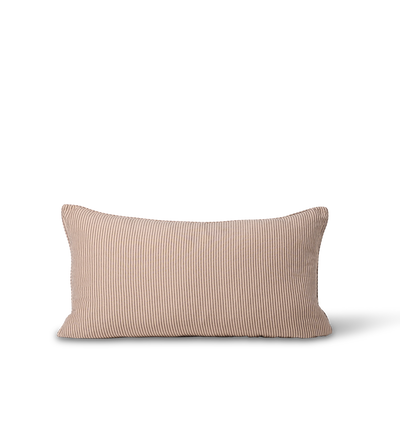 A rectangular lumbar throw pillow in a light beige striped fabric with fine vertical ribbed texture, shown against a plain white background.