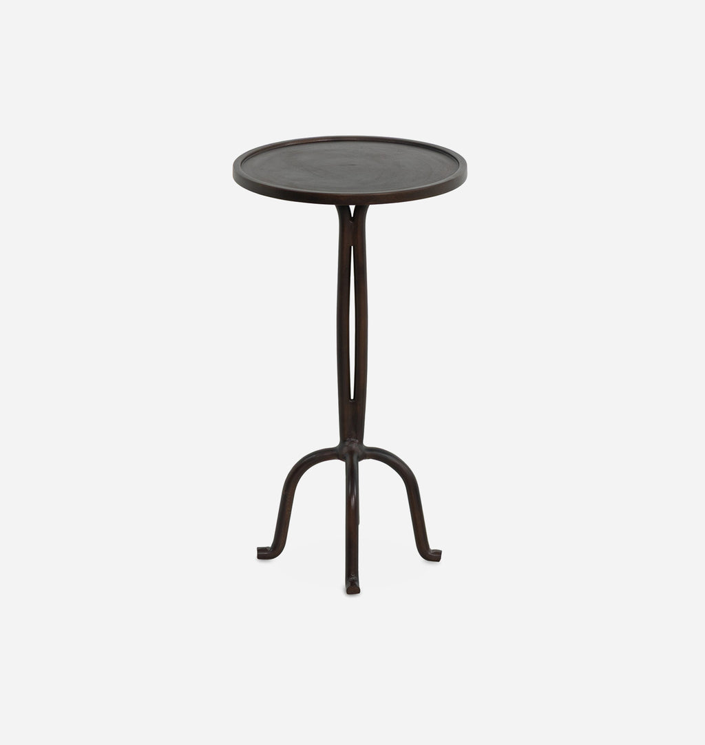 A dark brown metal bar table with a round top and three curved legs, shown against a plain light gray background.