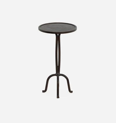A dark brown metal bar table with a round top and three curved legs, shown against a plain light gray background.