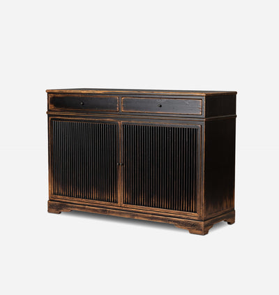 A dark brown wooden sideboard cabinet with two drawers on top and two vertically-slatted doors below, shown on a light gray background.