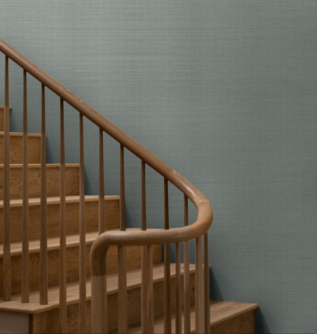 Field wallpaper in the color Slate, on a wall with a staircase