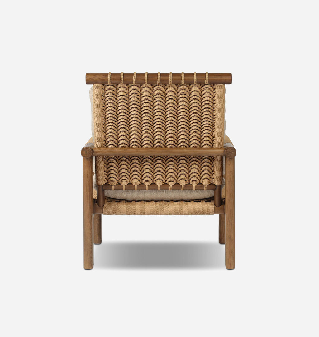 A modern wooden armchair with a woven rattan backrest and seat, shown from the front on a light gray background.