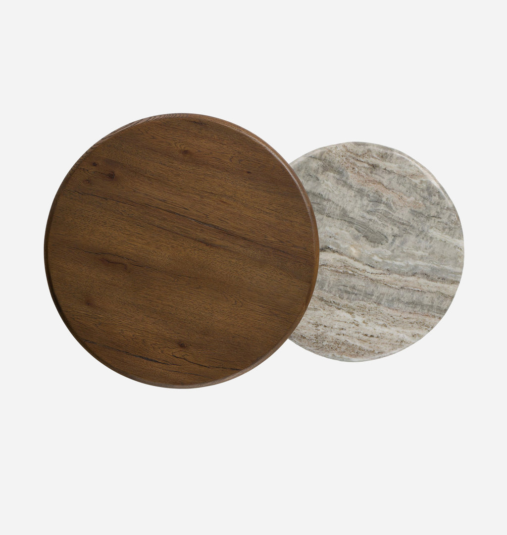 Two top down views of round end tables on a light gray background, one made of dark brown wood and the other of light gray and white marble with subtle beige veining.
