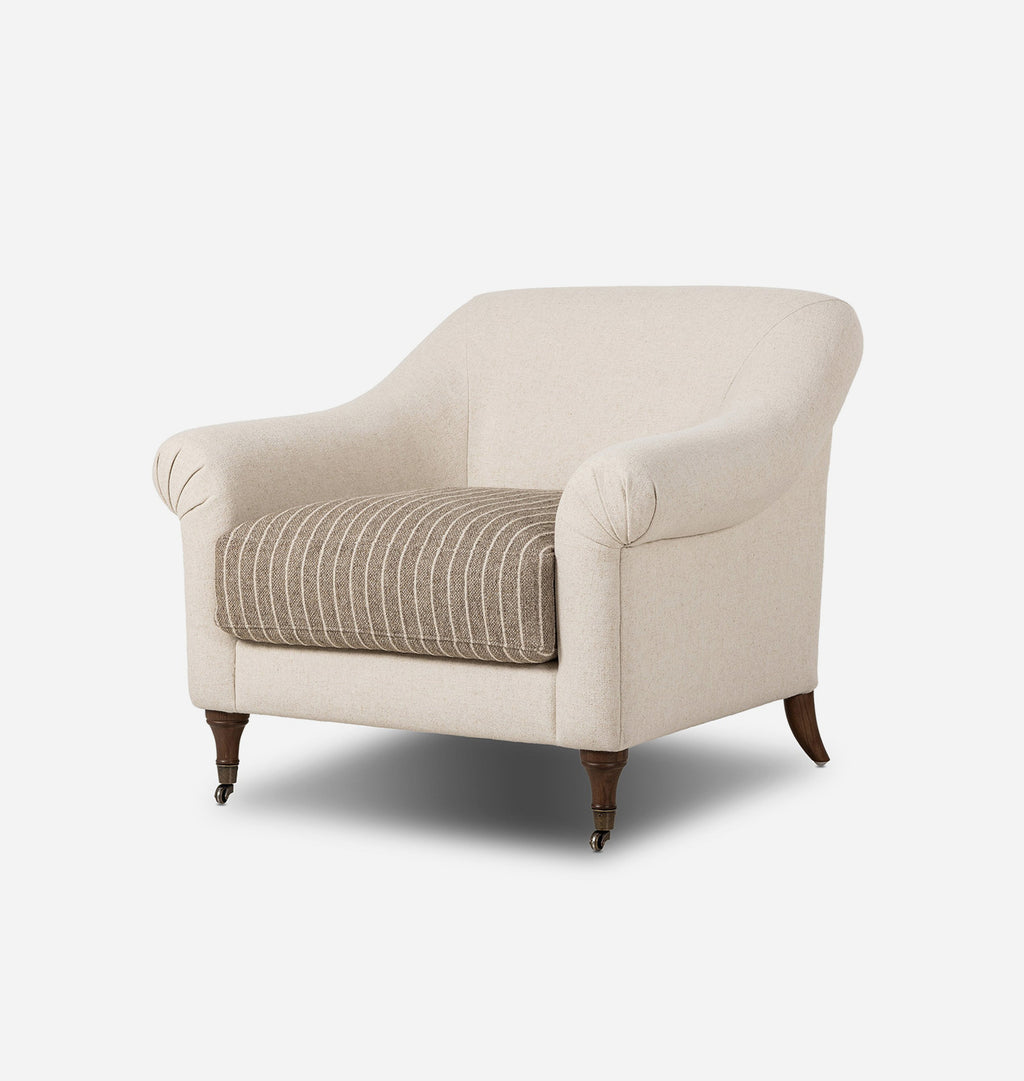 A classic armchair upholstered in a warm cream fabric with a striped brown and beige seat cushion, supported by dark brown wooden legs, shown against a plain white background.